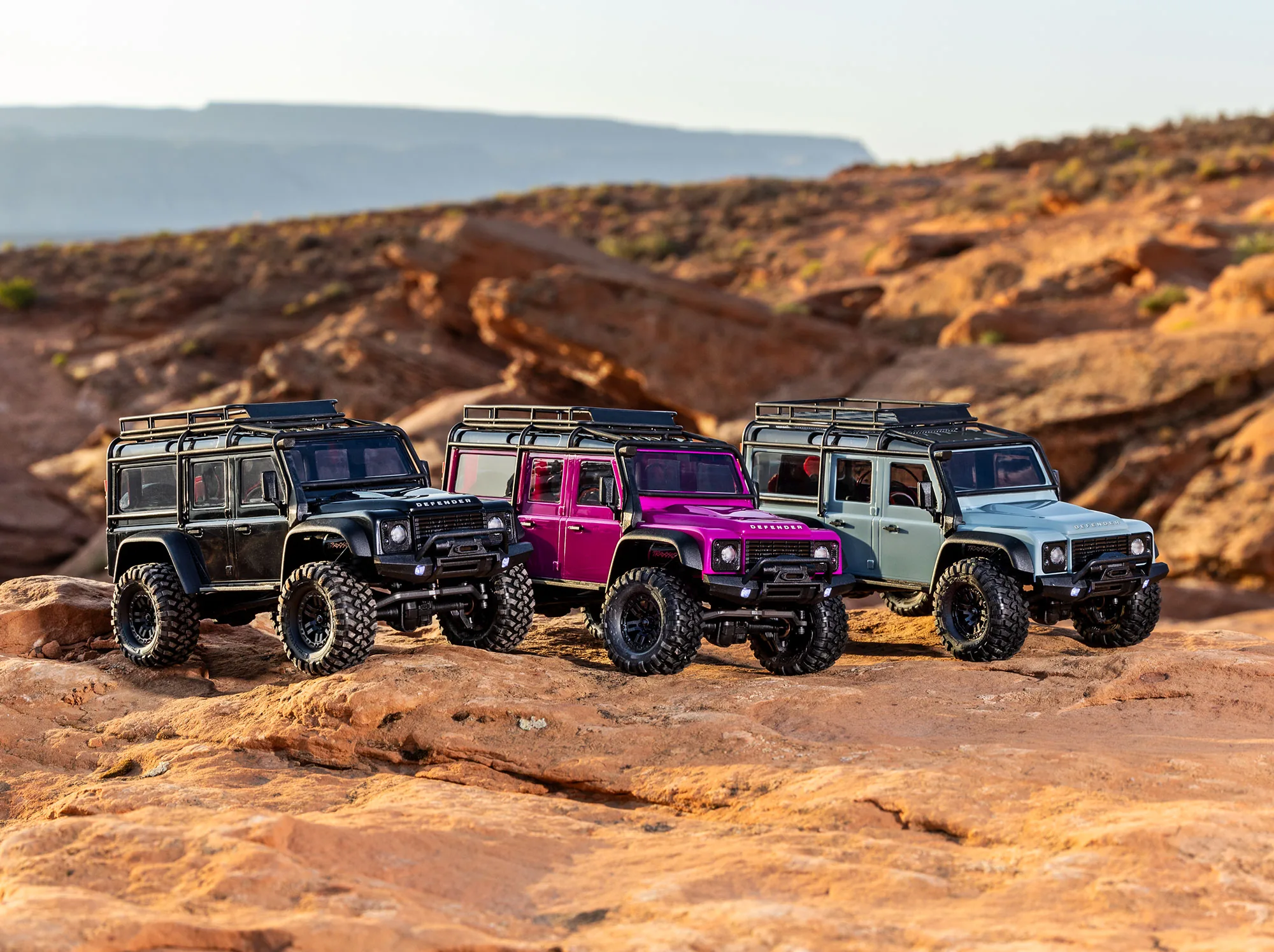 TRX-4M trucks staged on a rock course